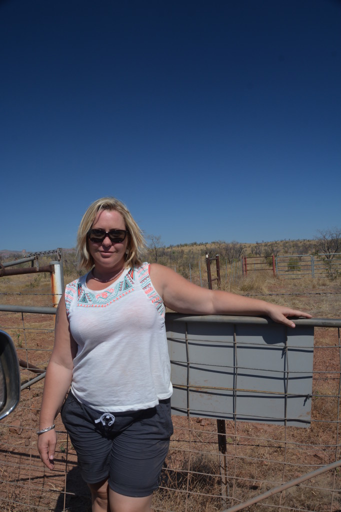 Michelle opening the gate at Home Valley Station, Kimberley Region, WA